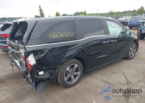 2020 Honda Odyssey Touring z USA, uszkodzony, nr VIN 5FNRL6H84LB037439